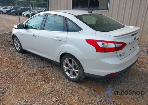 2012 Ford Focus Titanium z USA, uszkodzony, nr VIN 1FAHP3J2XCL346937